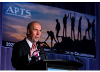 APTS President and CEO, Patrick Butler, speaking at a podium